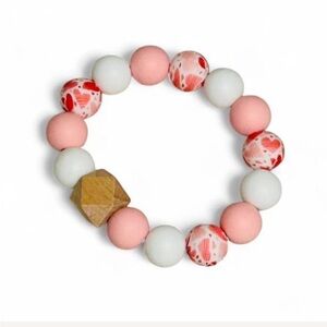 Handmade pink and white silicone beaded stretch bracelet heart pattern